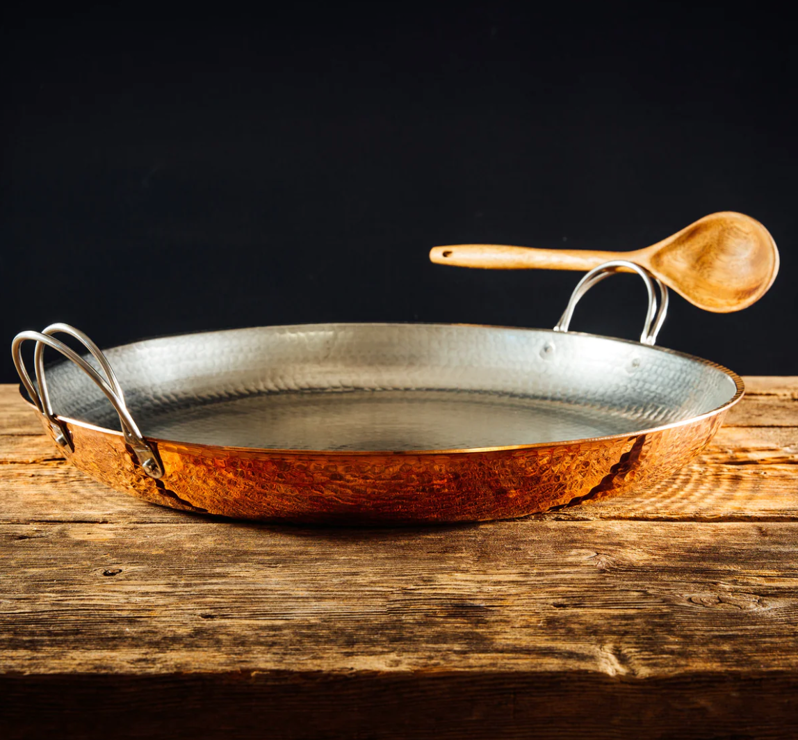 Hammered copper paella pan with stainless steel handle