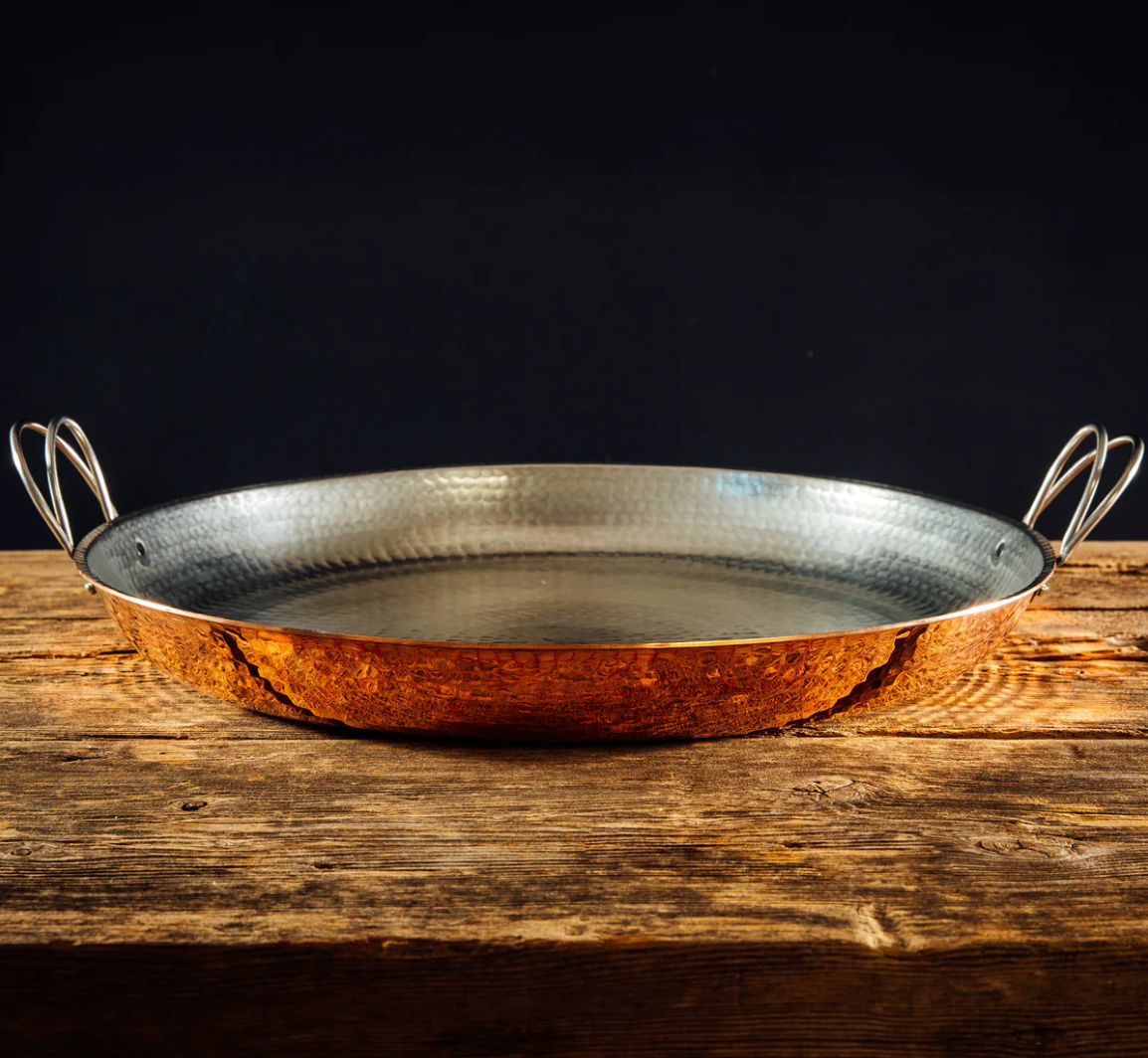 Hammered copper paella pan with stainless steel handle