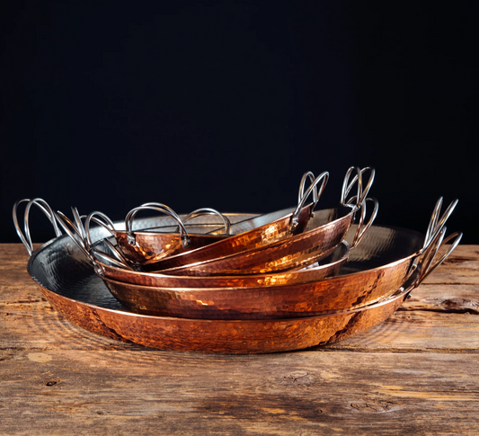 Hammered copper paella pan with stainless steel handle