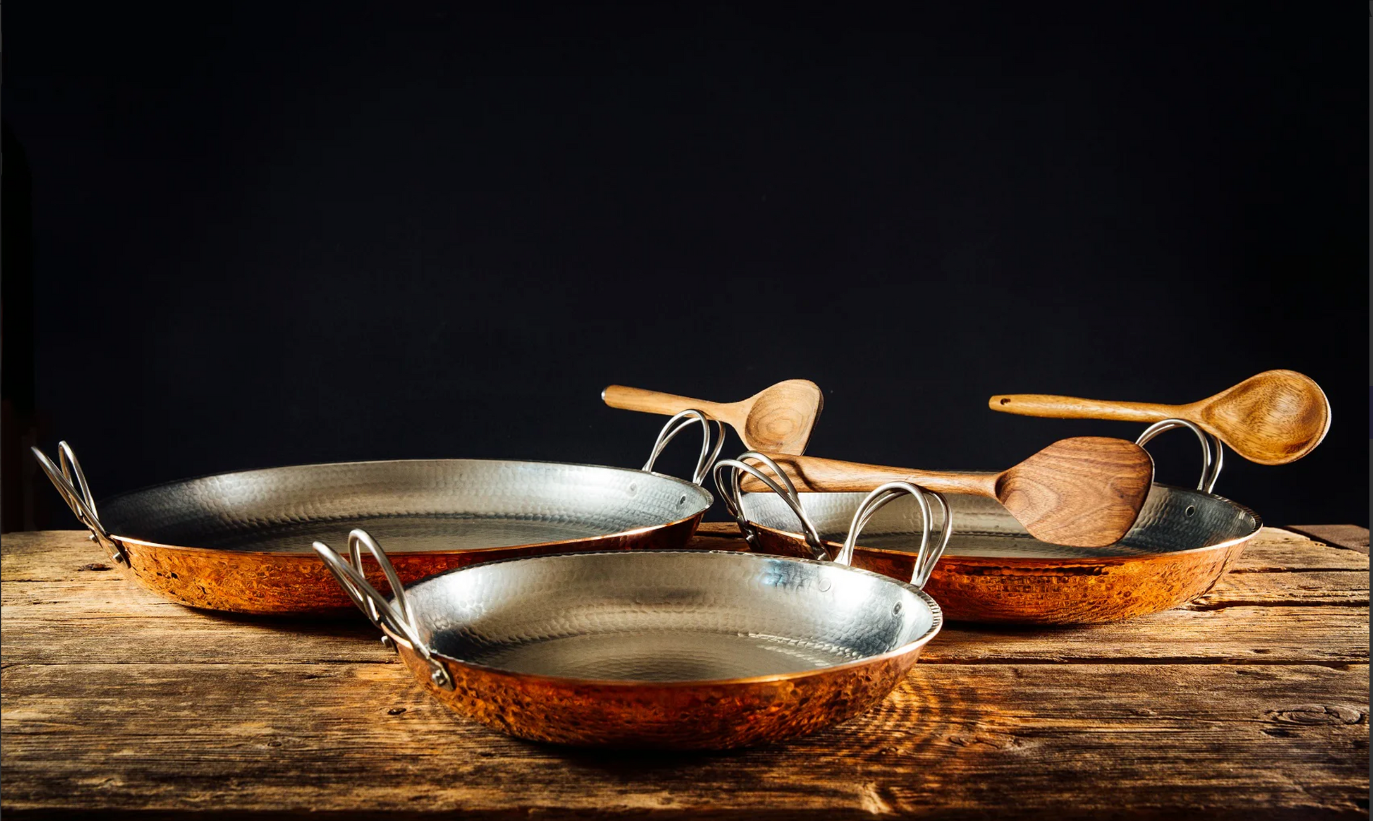 Hammered copper paella pan with stainless steel handle